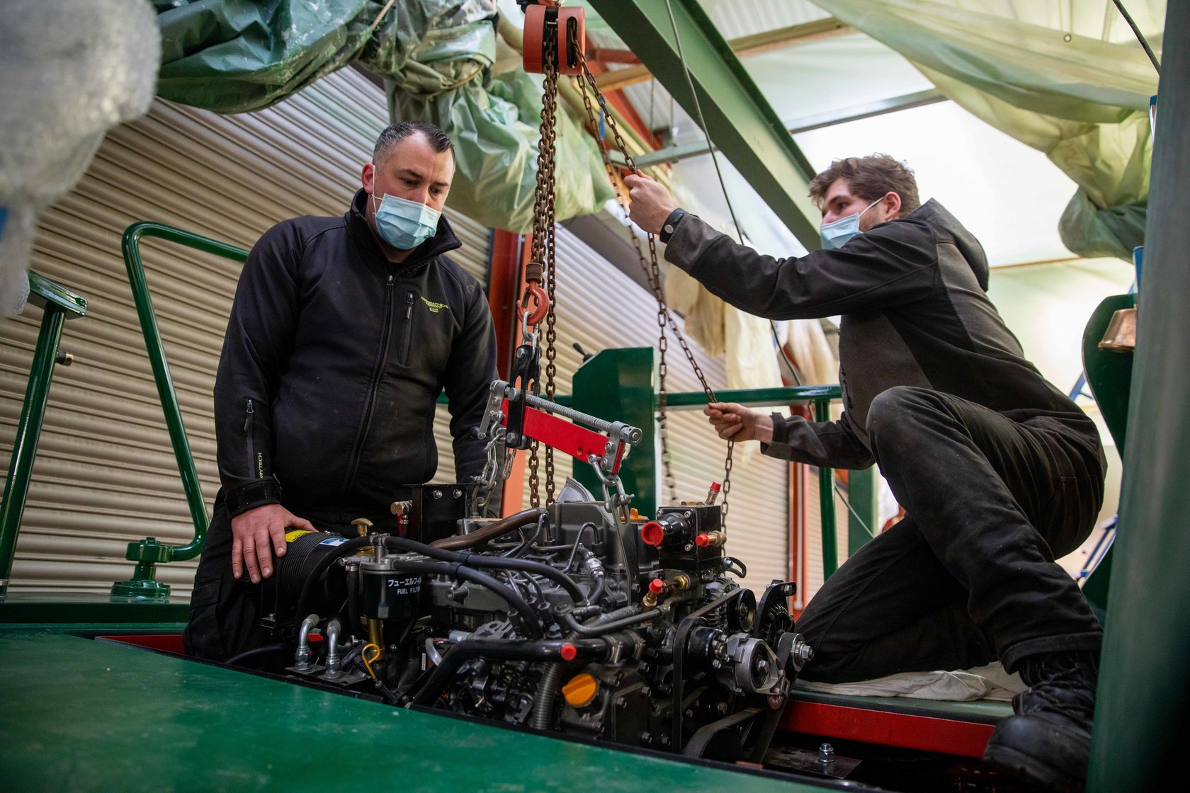 iengine being installed on the beacon park boat falcon