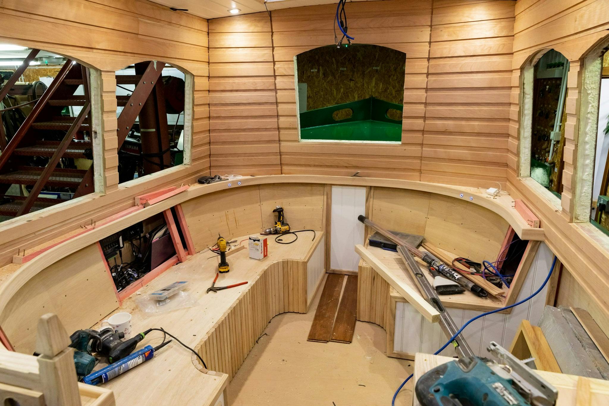 the inside of a shell of a beacon park canal boat during construction