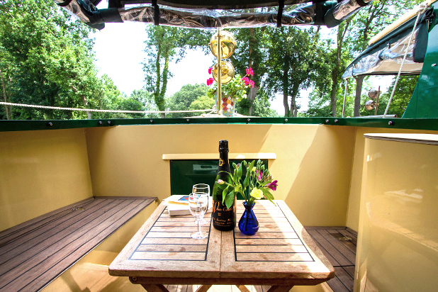 canopied front deck of beacon park boat hobby