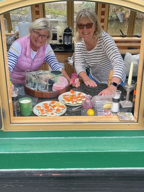 guests cooking on the mon and brec canal