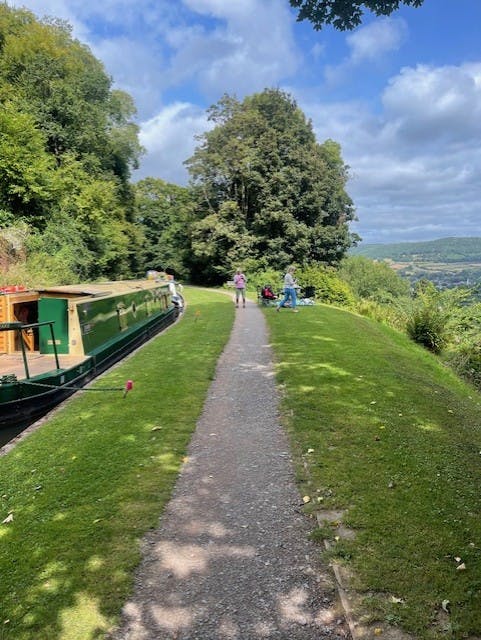 guests picnicking on the towpath of the mon and brec canal