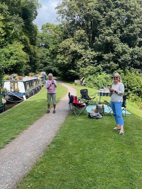 guests picnicking on the towpath of the mon and brec canal