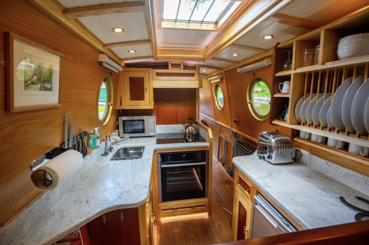 well appointed kitchen aboard beacon park boat coot