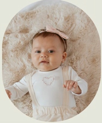baby liv looking at the camera