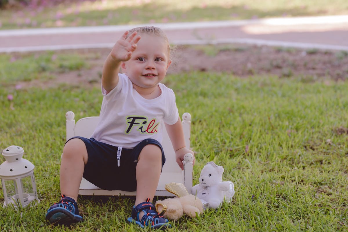 Baby boy sitting on a chair