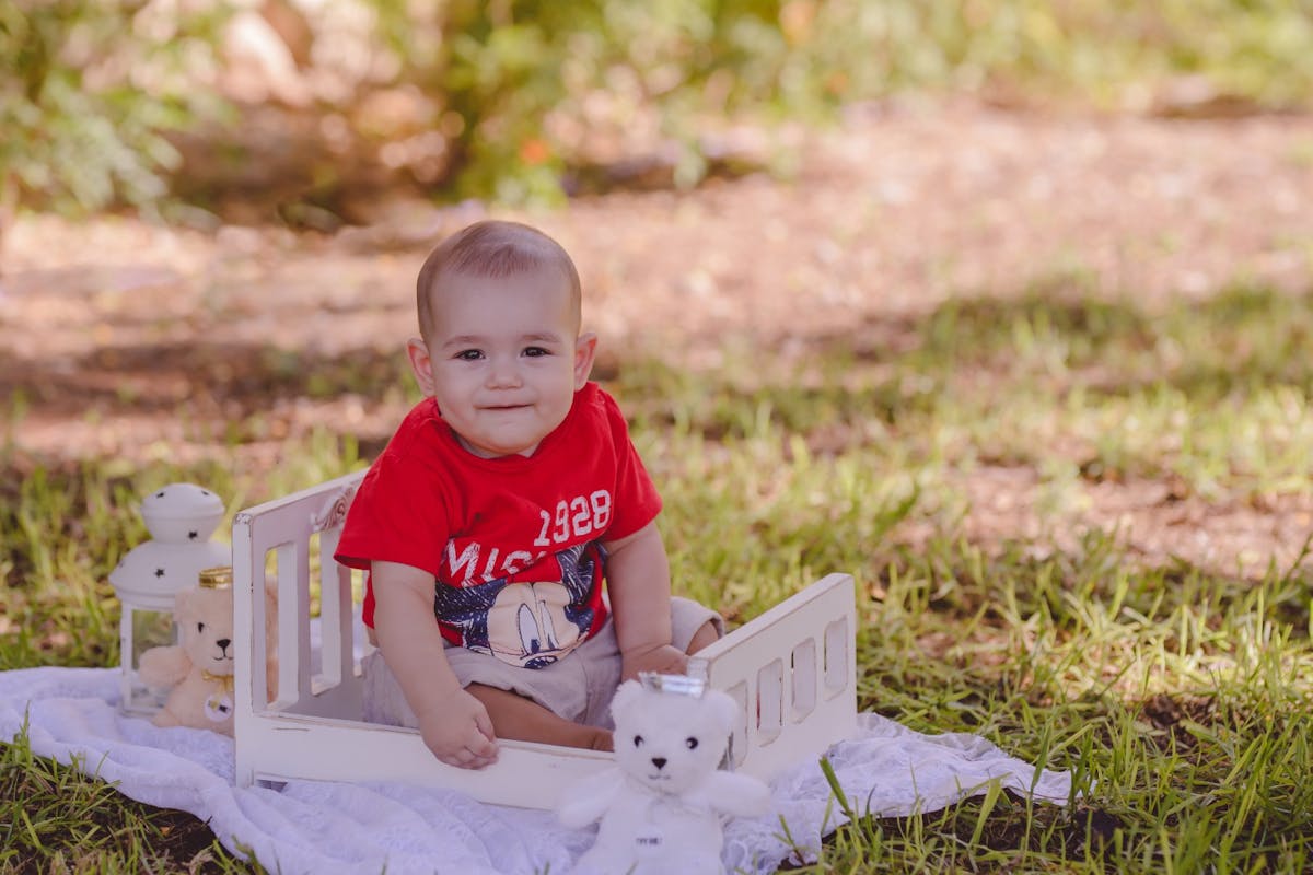 Baby boy sitting on a chair