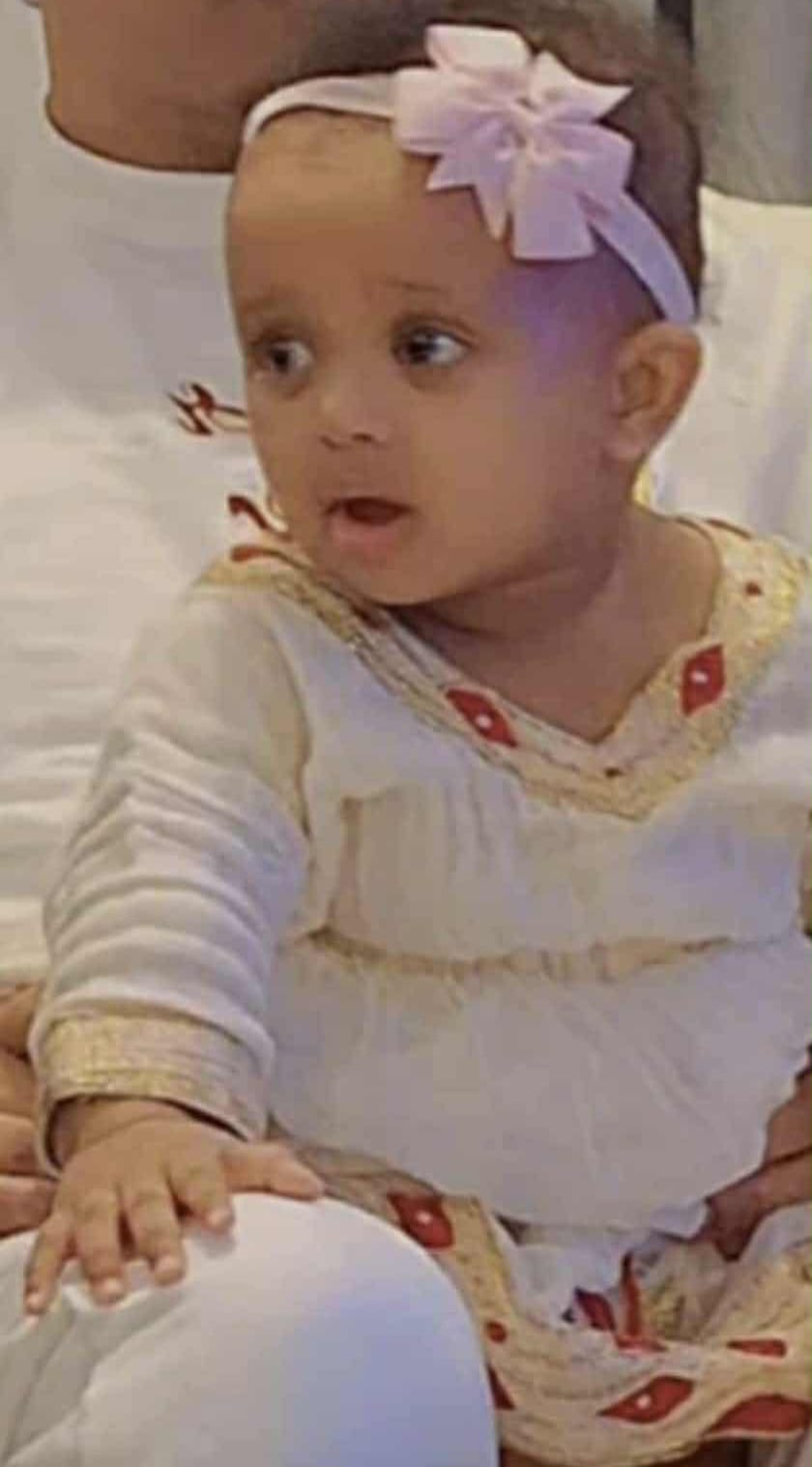 face of baby girl Salome with a rosette head band