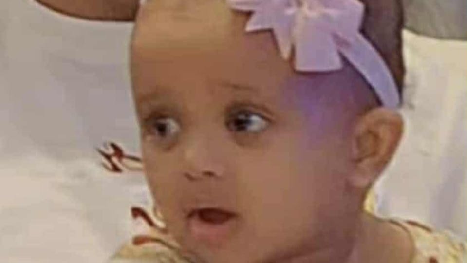 face of baby girl Salome with a rosette head band