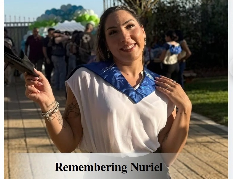 Nuriel in a white shirt