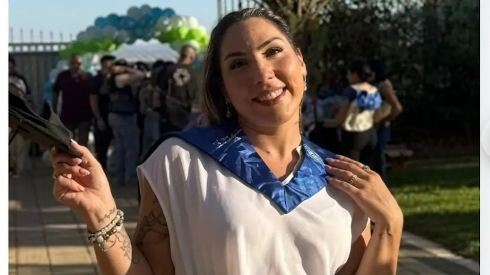 Nuriel in a white shirt