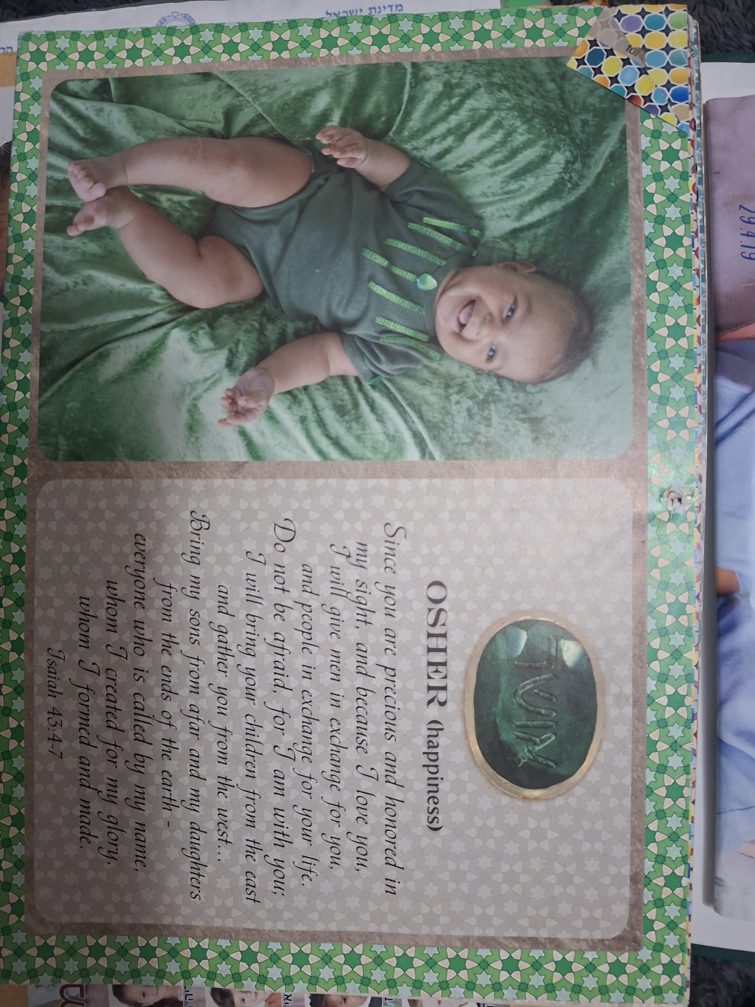 Osher on the calendar page from when he was a baby