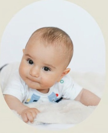 baby eitan looking at the camera