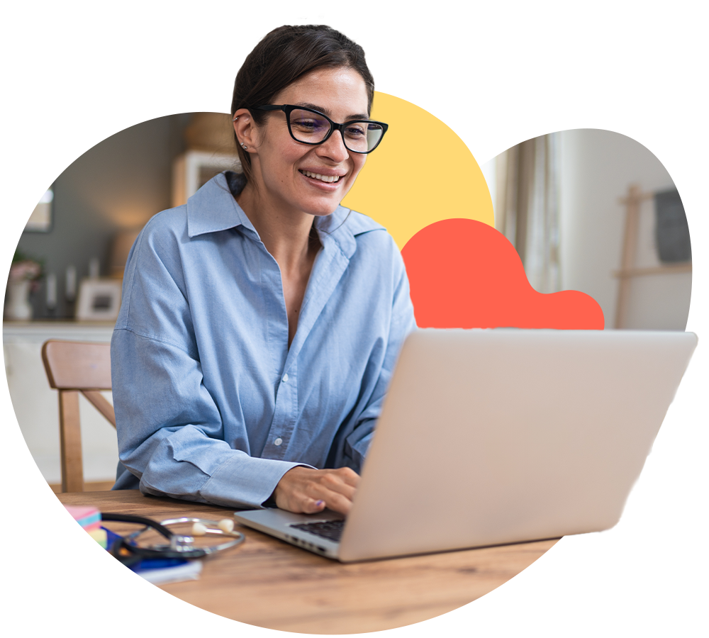 Young women on laptop, representing business owner doing her accounts