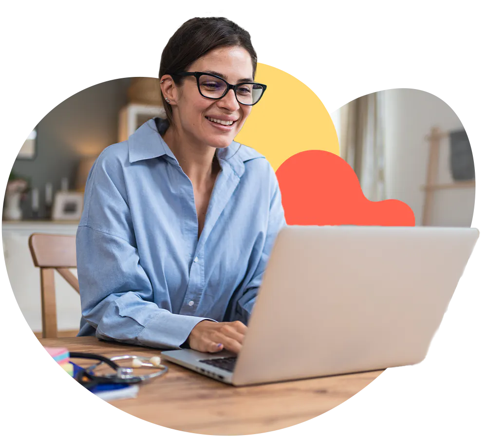 Young women on laptop, representing business owner doing her accounts