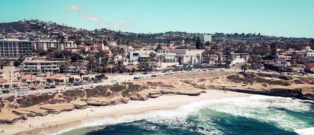 An image of San Diego real estate by the water. If you own a rental home in San Diego, you need to know your legal liabilities as a landlord.