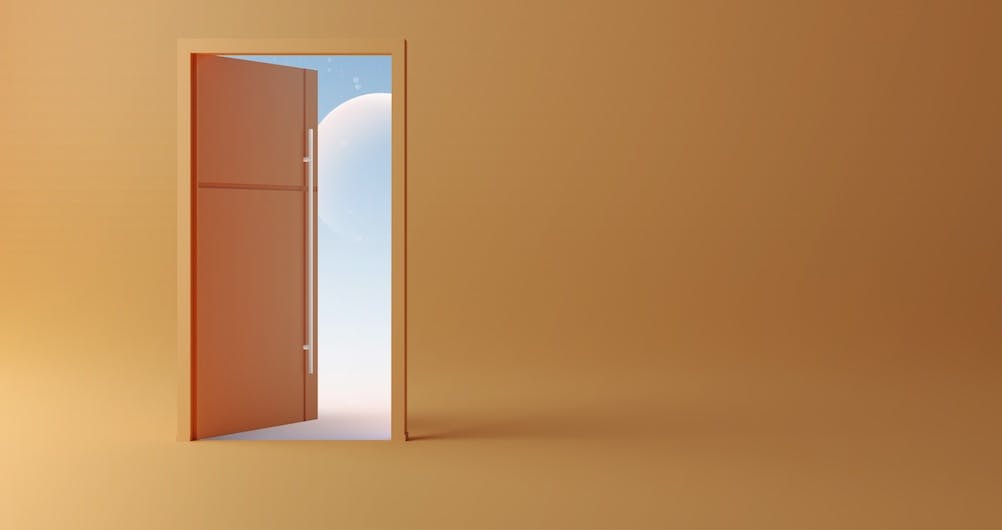 A orange background with an open door that leads to blue sky