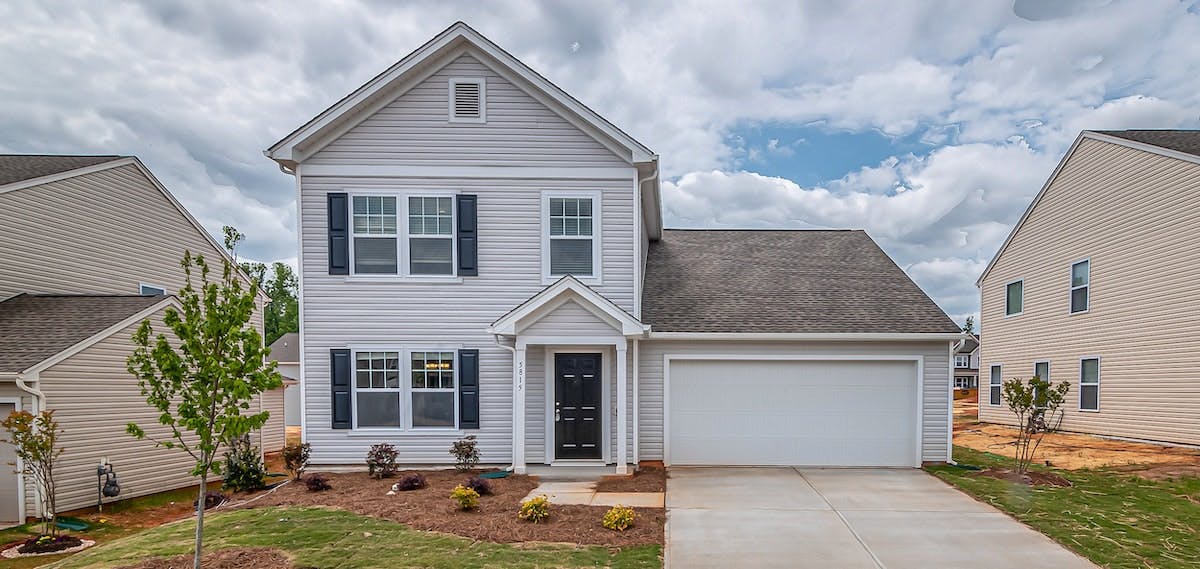 An American home with driveway and garage. If you've inherited a property, find out your options for what to do next