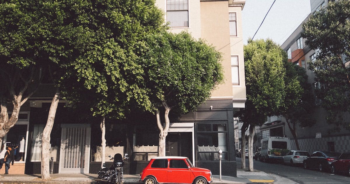 A photo of commercial and residential buildings in the neighborhood of Hayes Valley, San Francisco. Find out which is a better investment type for you - residential vs commercial real estate.