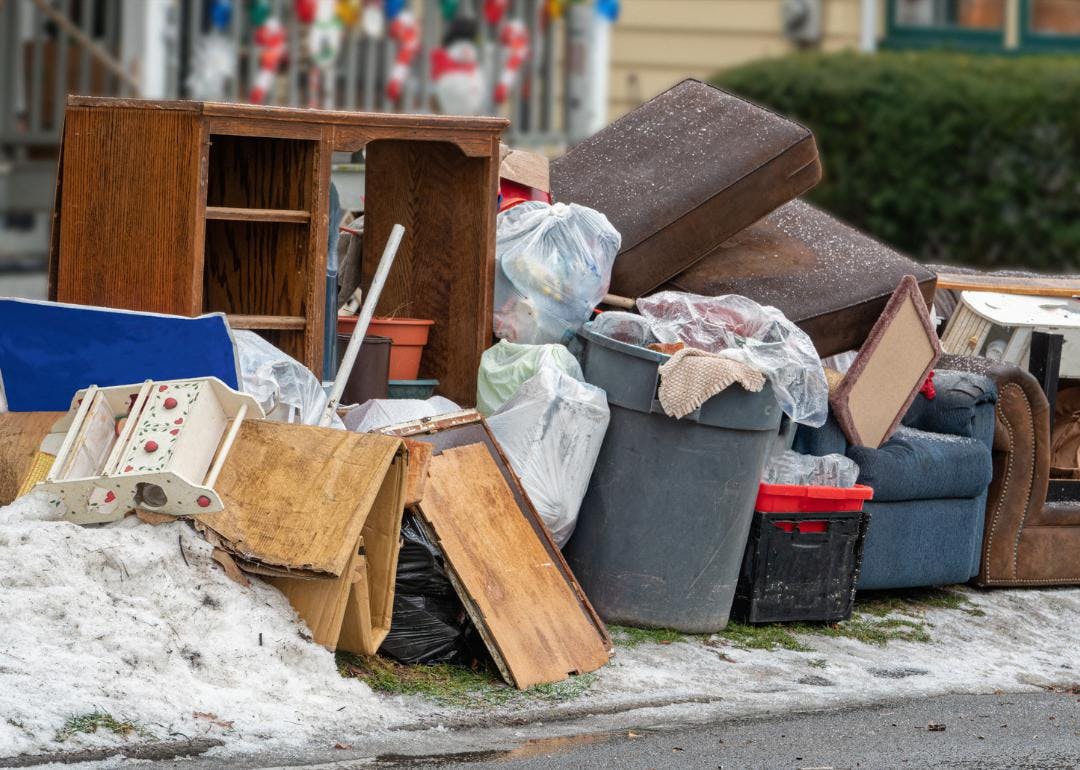 An image of discarded furniture on the sidewalk from an eviction