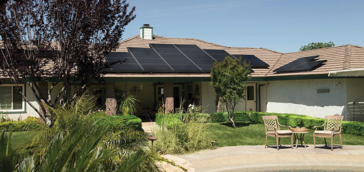 A photo of a single-family home with solar panels installed on the roof. Learn more about new tax credits and rebate for energy-efficient upgrades to your home and rental property. 