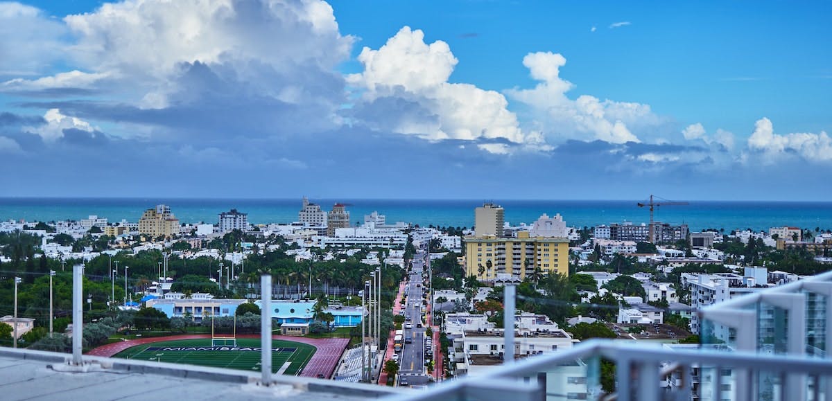 View of Miami from an apartment balcony. Learn how to price your Miami rental property