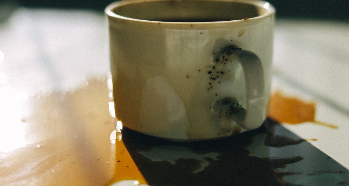 An image of spilled coffee - a common way accidental damage can occur to rental home carpets and flooring from stains