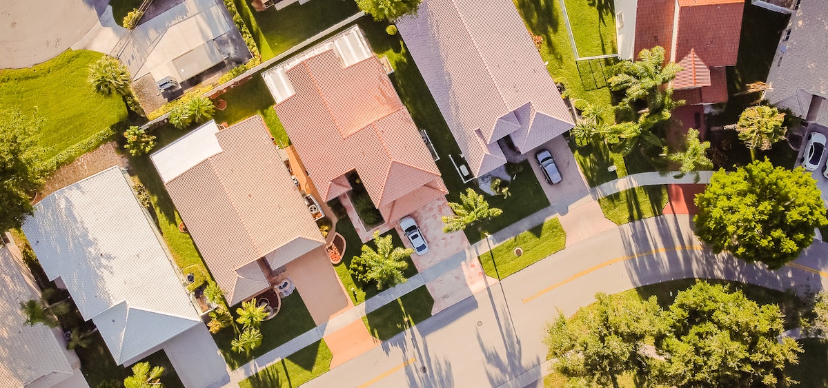 A birds-eye view of single-family homes in a local neighborhood