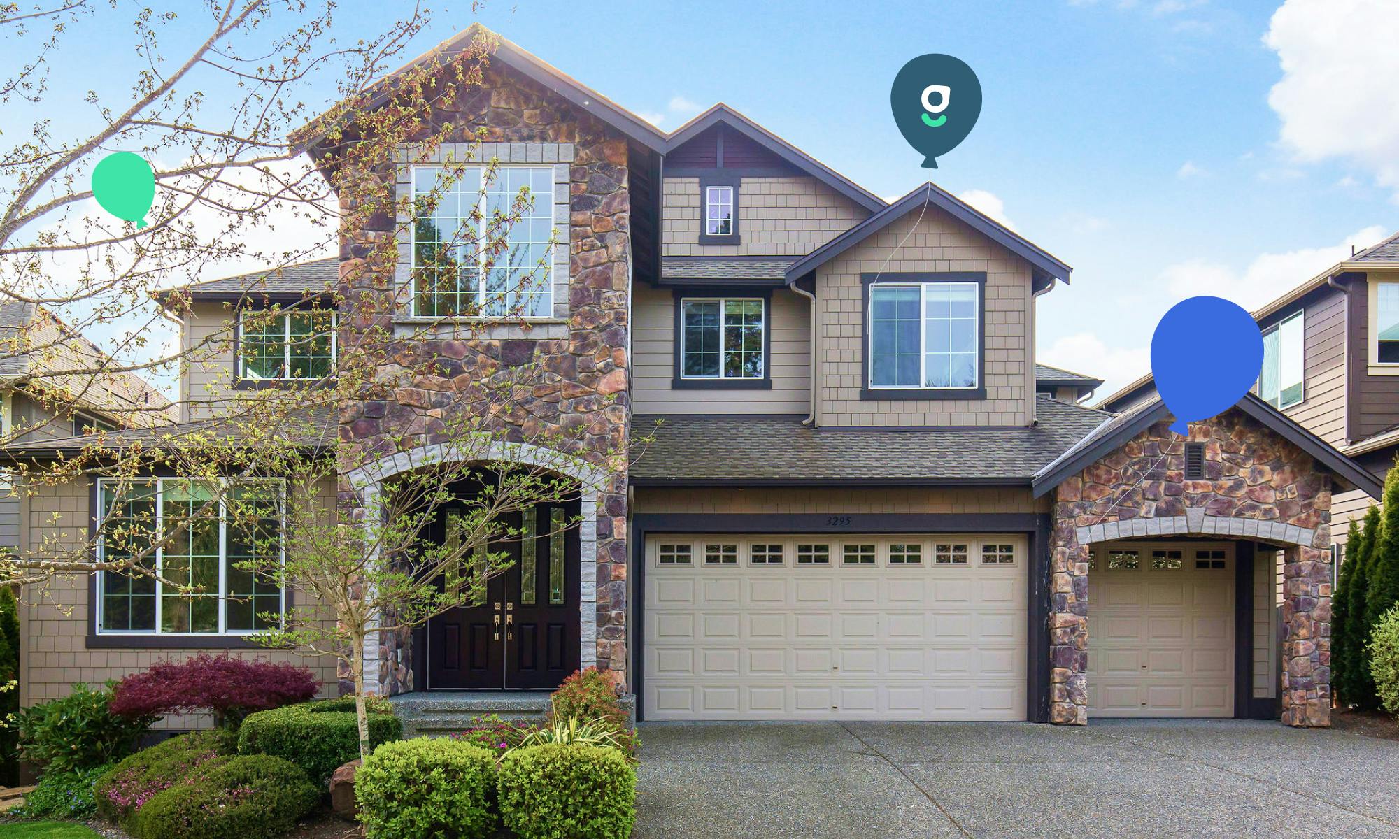 A photo of a single-family rental home with graphics of balloons and the Belong logo