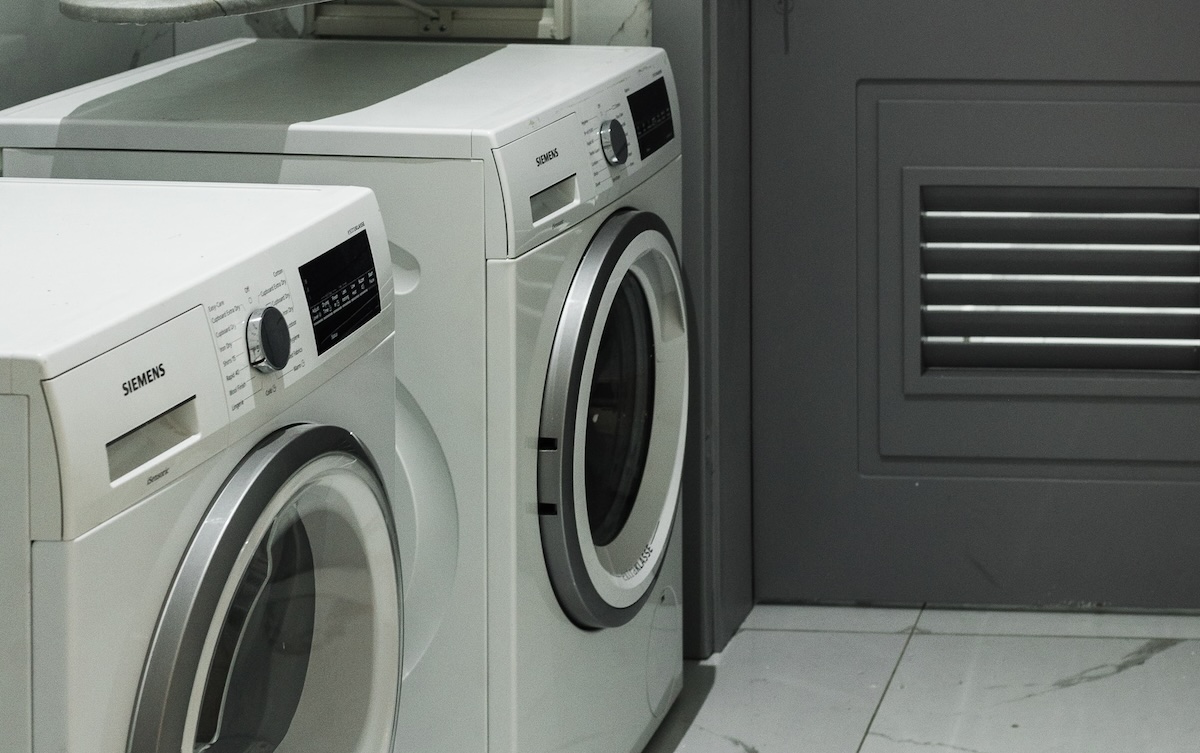 A clothes dryer in a rental home, which should be inspected and cleaned regularly