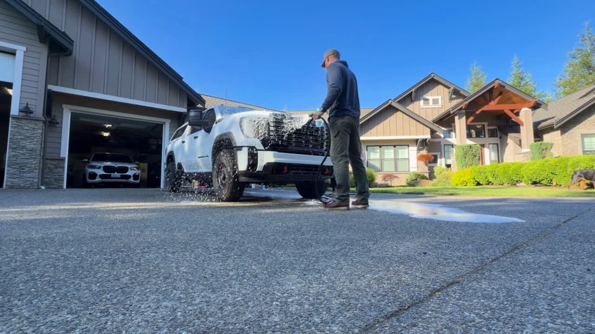 Washing road grime off a ceramic-coated GMC Sierra