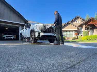 spraying truck with foam soap