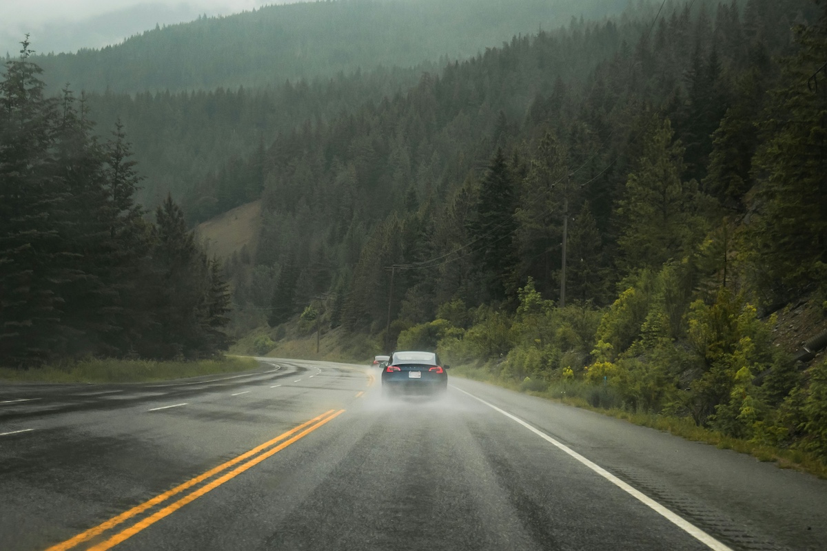 tesla driving in the mountains