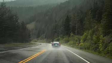 tesla driving in the mountains