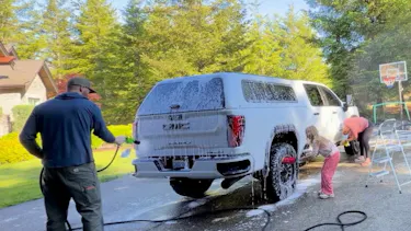 spraying truck with foam soap