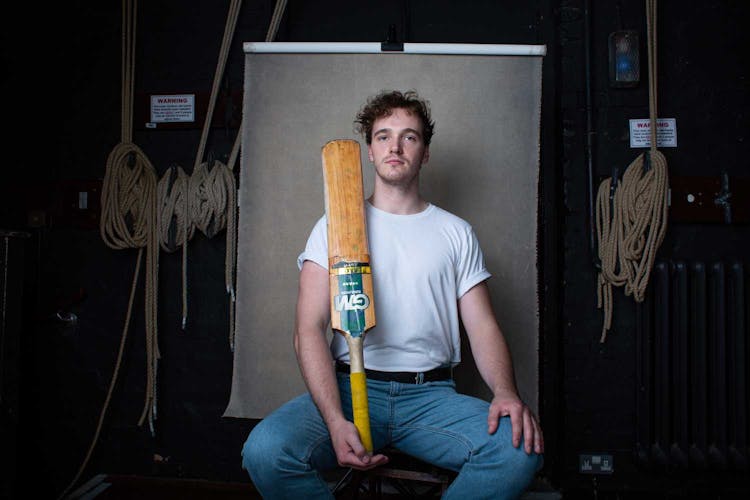 portrait of actor with cricket bat
