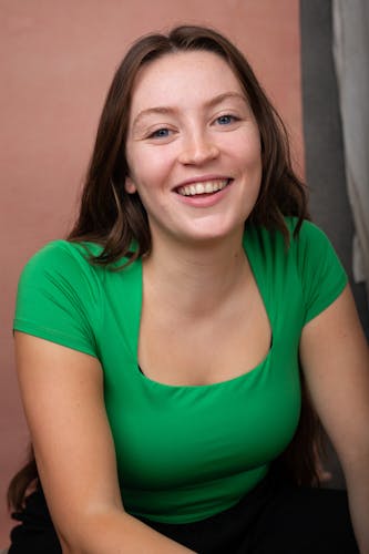 a smiling headshot of an actor 