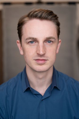 a headshot of a London actor taken in a natural light studio