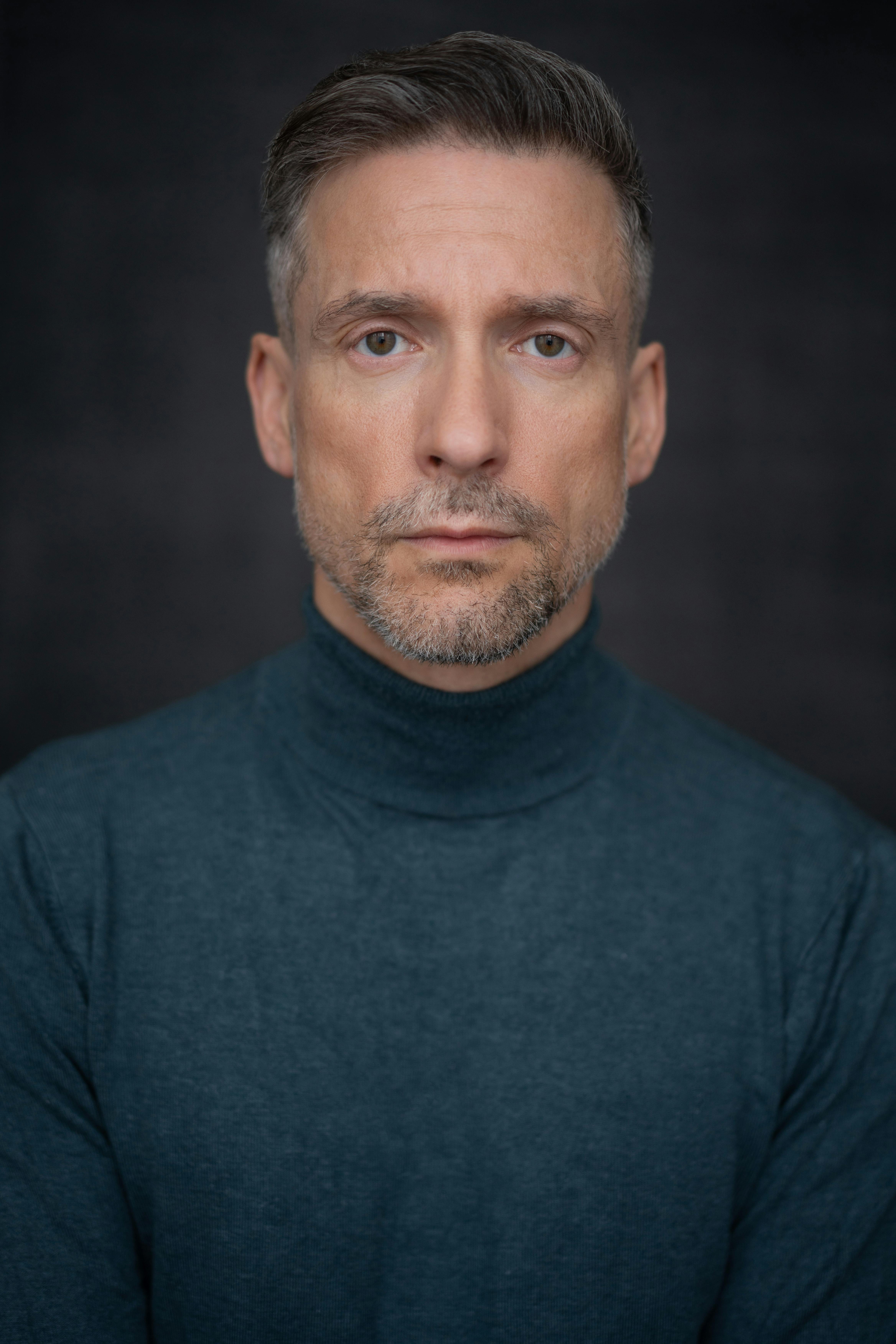 an actors headshot of a Westend performer