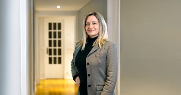Woman in an office setting.