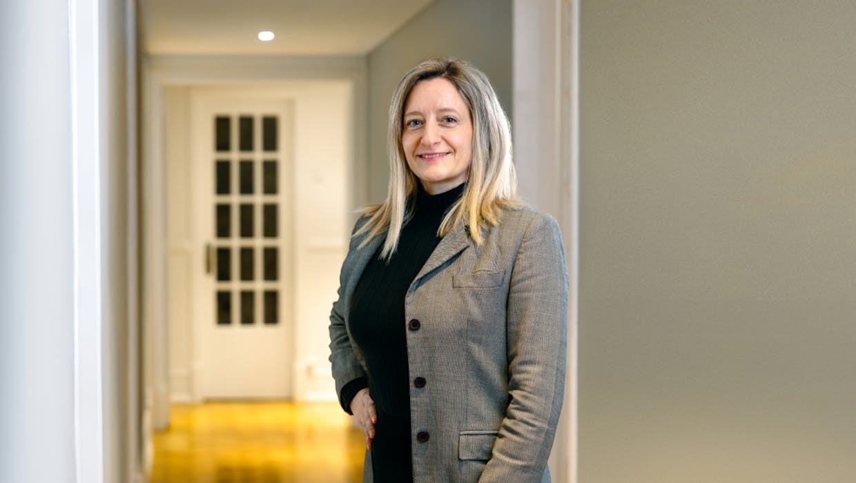 Woman in an office setting.