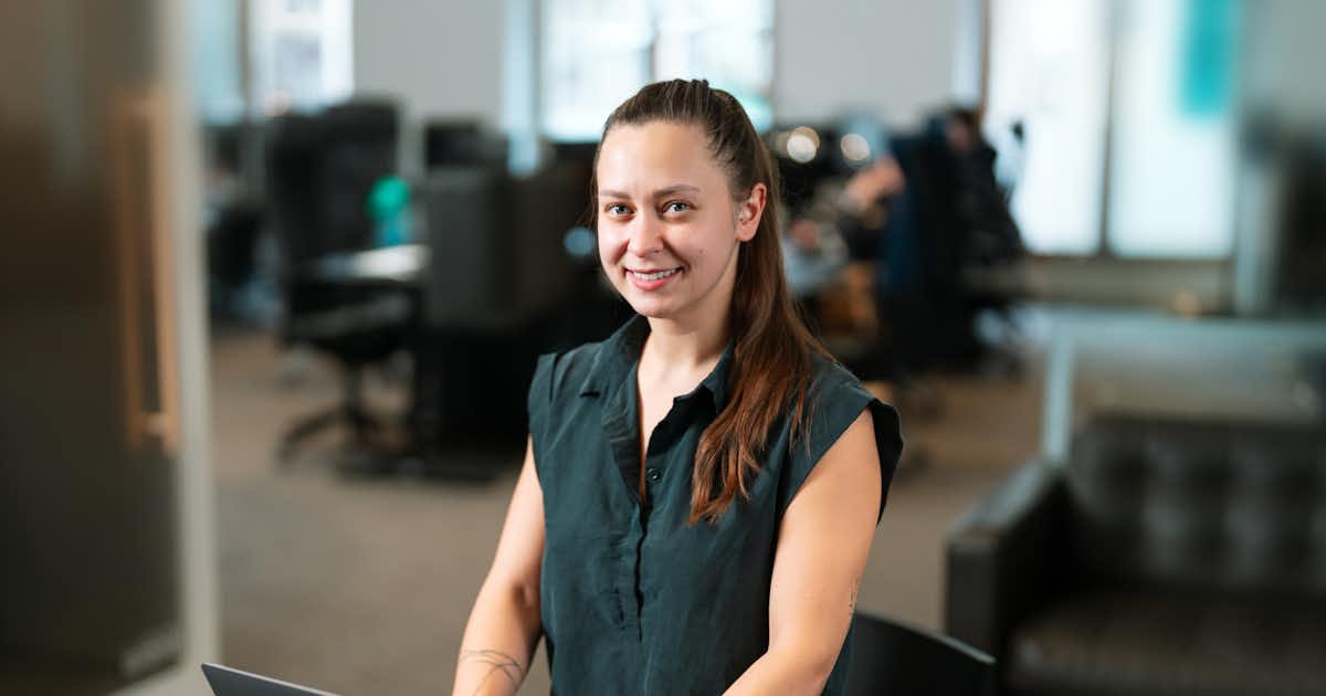 Woman in an office setting.