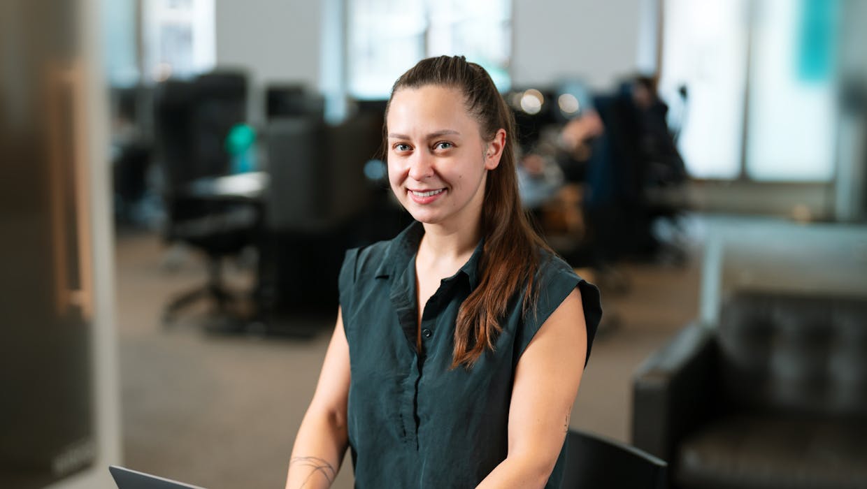 Woman in an office setting.