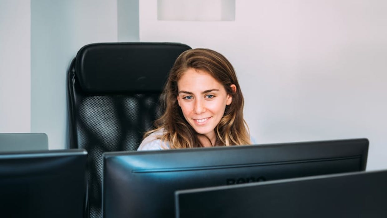 Woman looking at computer screen
