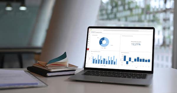 A photo of a laptop on a table.