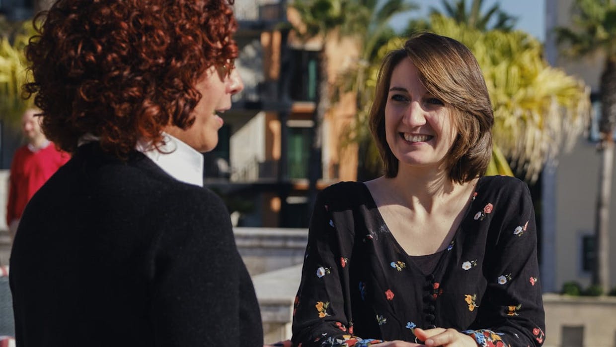 Two women conversing