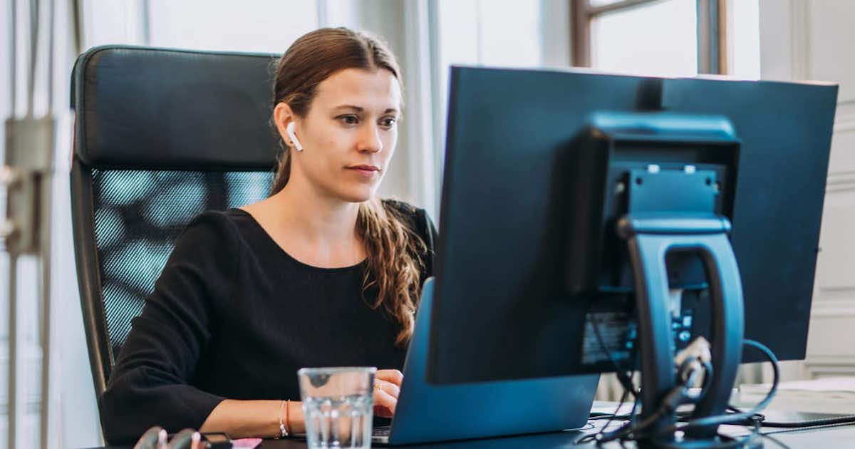Woman sitting at computer