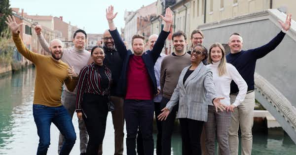 Group of happy employees outdoors
