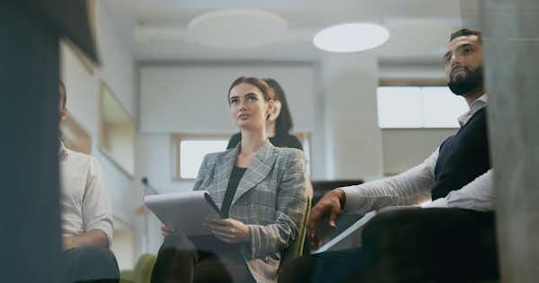 Several employees talking