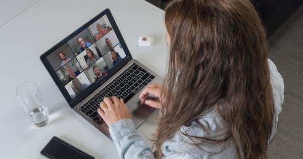 Woman typing on laptop computer
