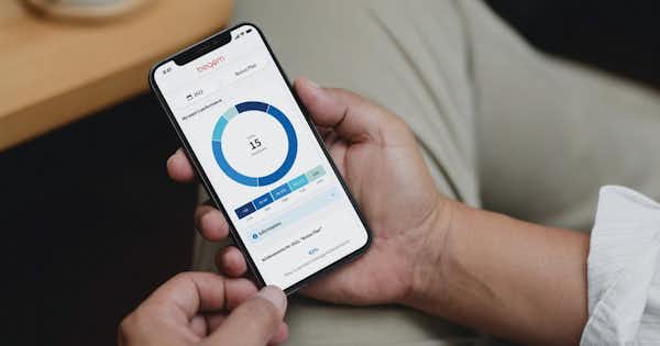 Mobile phone showing compensation and performance data